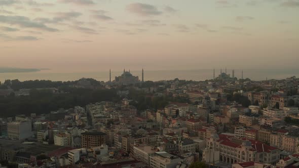 Two Mosques on a Hill at Hazy Sunrise in Istanbul, Aerial Forward alt