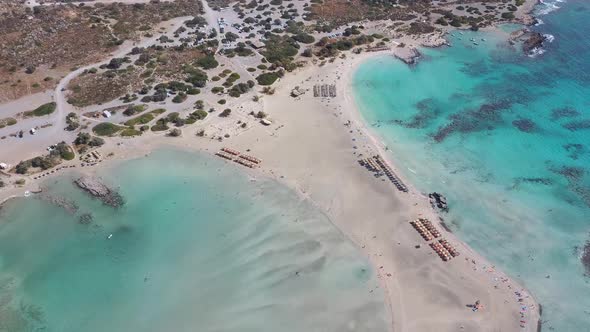 Aerial bird view of a paradise beach with umbrellas. Idyllic vacation alt