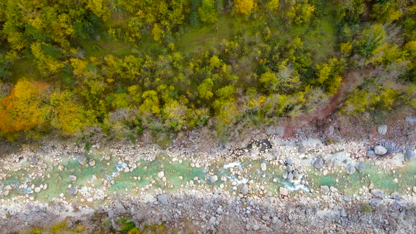 steep green mountains, deep forest and mountain road, beautiful valley and river alt