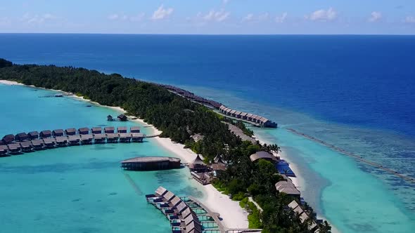 Aerial drone landscape of lagoon beach by blue water with sand background alt