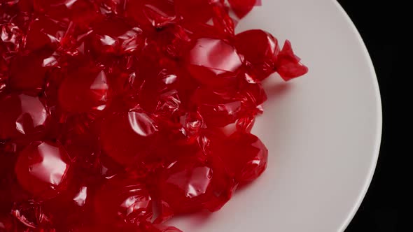 Rotating shot of cinnamon candies  alt