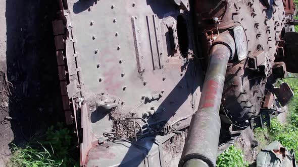 Vertical Video of a War in Ukraine  Destroyed Military Hardware alt