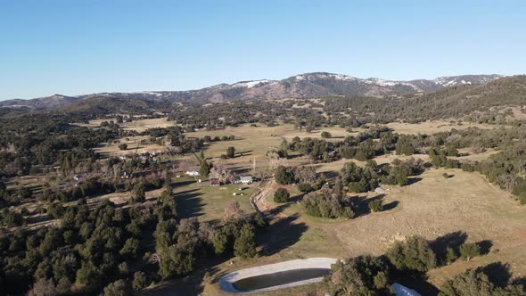 Aerial View of Valley with Farmland an Forest in Julian California USA alt