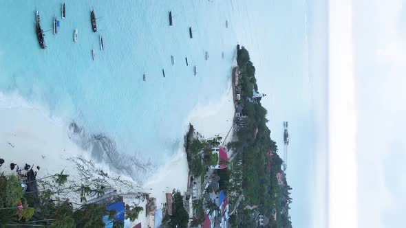 Vertical Video of the Ocean Near the Coast of Zanzibar Tanzania Aerial View alt