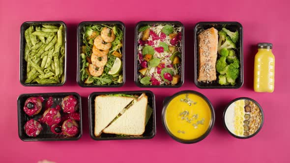 Food Delivery Top View Take Away Meals in Disposable Containers on Pink Background alt