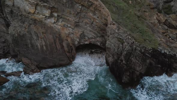 Crohy Head in Donegal Ireland waves crash into cliffs alt