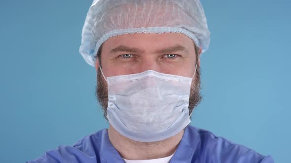 Face of Doctor in Mask and Cap alt