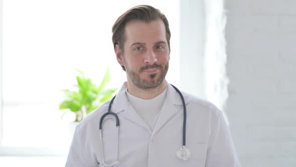 Portrait of Young Doctor Showing No Sign By Finger Denial alt