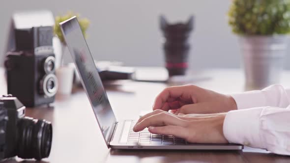 Man Working On Laptop (2K) alt