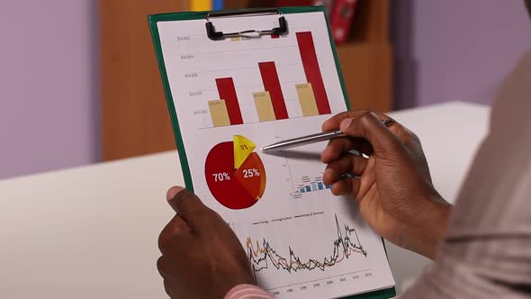 Businessman Working with Charts alt