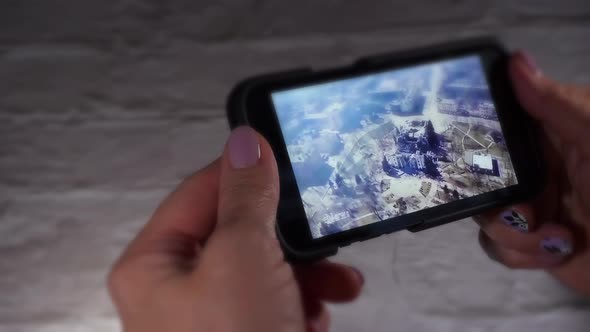 Closeup Shot of Watching Social Media From a Smartphone to Be Informed alt