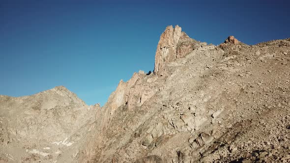 Rocky mountains in the alps during a sunrise. cabane Orny, Switzerland. Aerial drone view alt