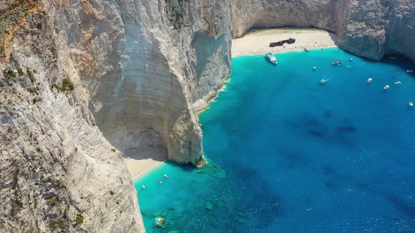 View of Navagio beach, Zakynthos Island, Greece. Blue sea water. alt