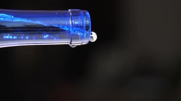 Water Pouring From a glass Bottle alt