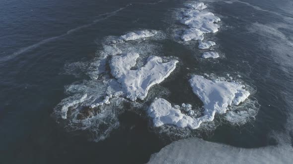 Antarctica Ocean Open Water Rock Aerial View alt