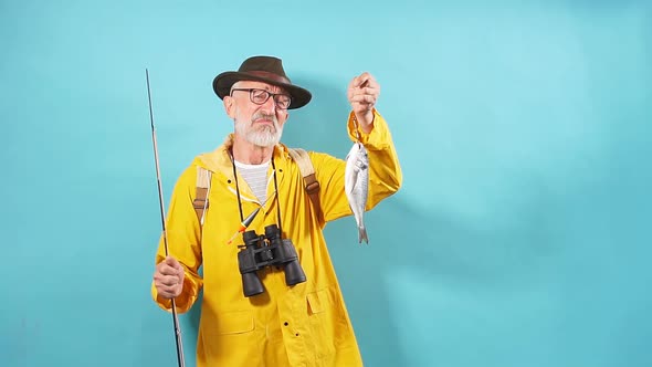 Depressed Old Man Is Crying. He Couldn't Catch Many Fish alt