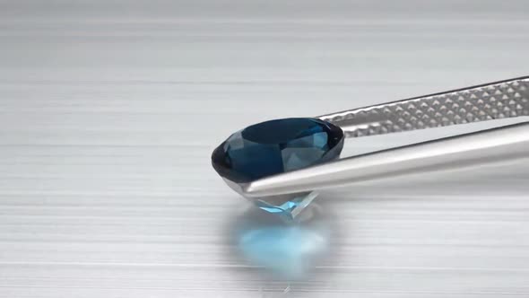 Natural London Blue Topaz Heart Cut in the Turning Tweezers
