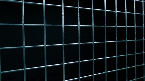 Metal Fence On Black Moving Shot alt