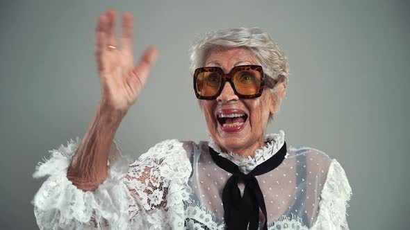 Happy elegant grandmother alt