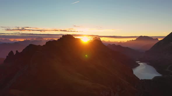 Sunrise in the Dolomites. Mountains and Valleys. Lago Di Fedaia, South Tyrol