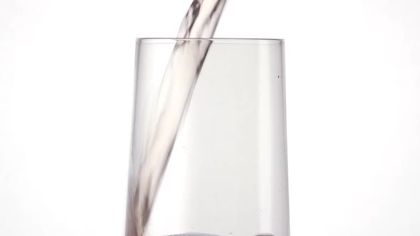 Closeup of Glass with Sparkling Rose Wine Decorated Gold Star Confetti Celebration Party alt