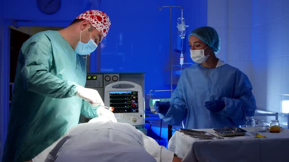 Surgeon Doing Surgery in Operating Room in Hospital