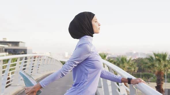 African American man using his phone in the street alt