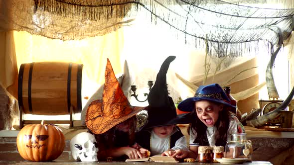 Happy Kids Celebrating for Halloween. A Terrible Night at Home. Trick or Treat Children. alt