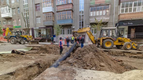 Excavator at Working on Pipeline Construction Site of Replacing Water Supply Pipe Timelapse alt