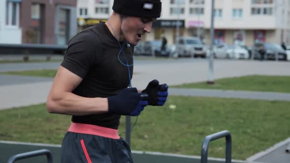 Man training outdoors on sports field