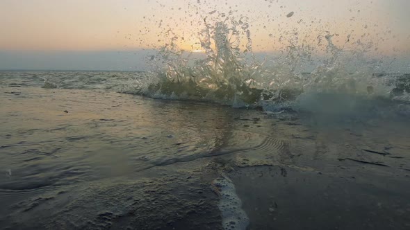 Sea Wave Crashing Against a Concrete Pier During a Storm alt