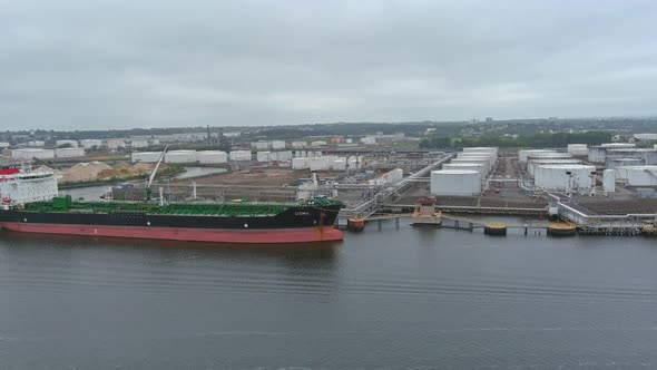 Oil Tanker the Process of Unloading Tanker in Port with Top View alt