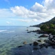 Aerial View Of Beau Vallon Beach And Rocks And Palms, Mahe Island, Seychelles  - VideoHive Item for Sale