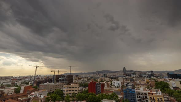 Barcelona Skyline Timelapse with Passing Clouds alt
