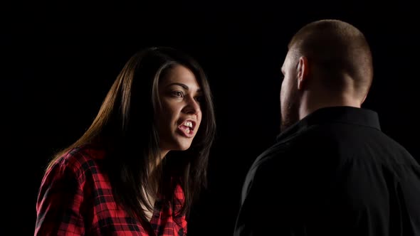 Conflict of Couple with Shouting. Isolated on Black Background alt