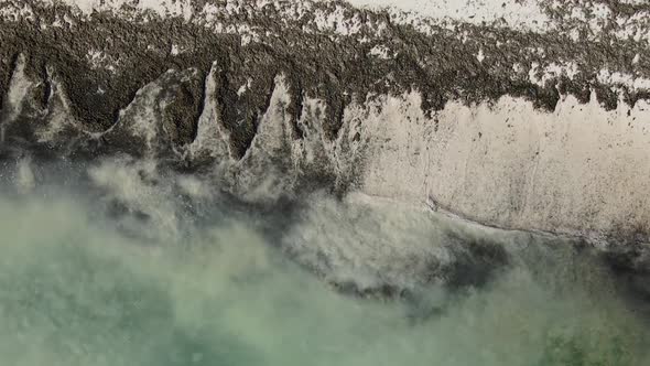 Vertical Video of the Ocean Near the Coast of Zanzibar Tanzania Aerial View alt