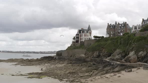 Brick houses near the coast line alt