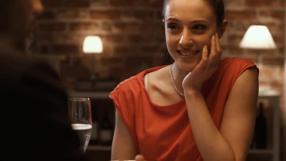 Young happy couple dating at the restaurant