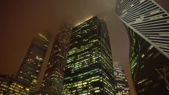 Modern Futuristic Moscow Skyscrapers Moscow City Downtown in Fog at Night Ominous View of Moscow Sky alt