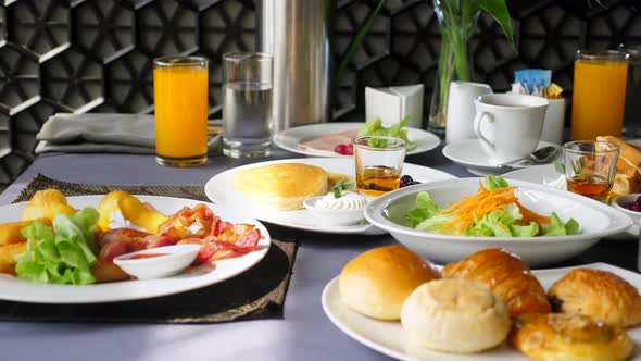 Table with Food and Drinks for Dinner Lunch or Brunch in Restaurant or Cafe alt