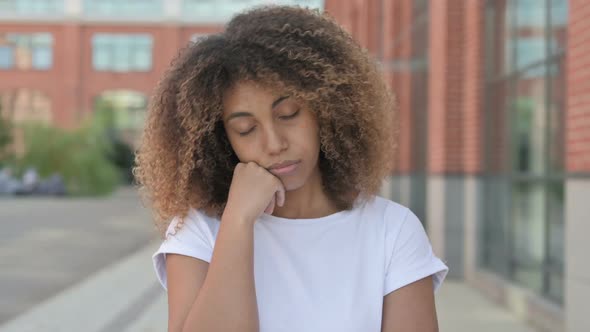 Sleeping African Woman Taking a Nap Outdoor alt
