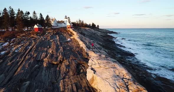 Aerial view of Curtis island lighthouse Camden Maine USA as the sun sets alt