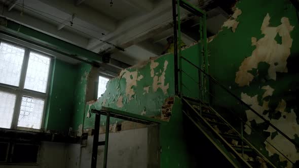 Worker with Hammer Destroying Wall alt