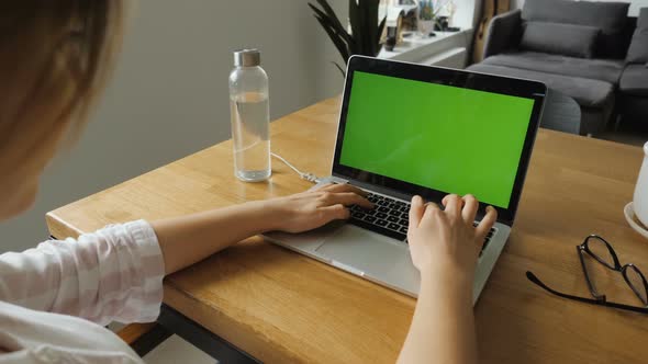 Girl Working With Green Screen Laptop