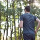 Adult Man in Sportswear Jogging on the Park in Early Morning - VideoHive Item for Sale