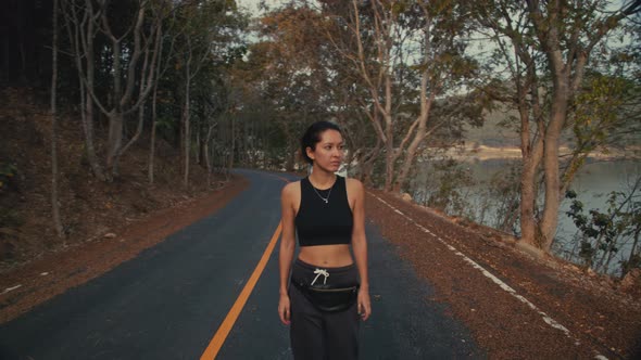 Woman Having Car Troubles on the Road alt