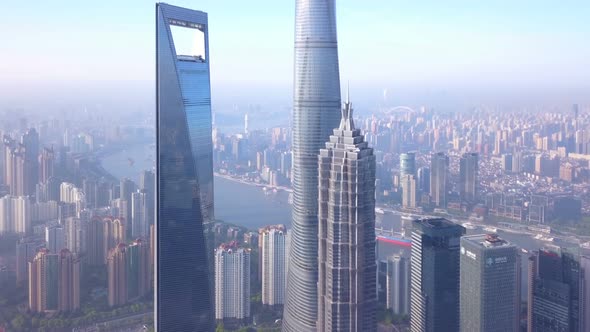 Aerial view of skyscraper and high-rise office buildings in Shanghai Downtown, China. alt