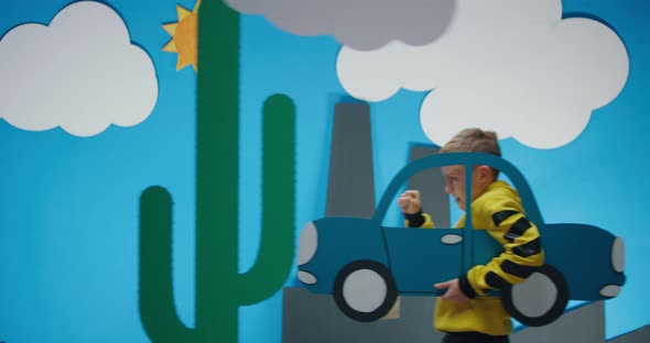 Boy Driving Cartoon Car and Waves alt