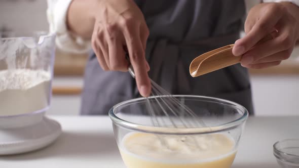The Process Of Making Pancakes In The Early Morning Mom Cook Prepares Batter For Baking Pancakes alt