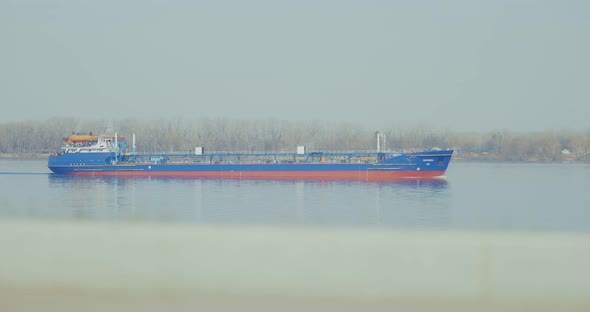 Cargo Ship Sailing on Water alt
